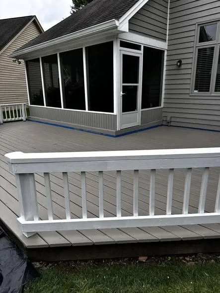 After: deck refinish: gray stain and white railing
